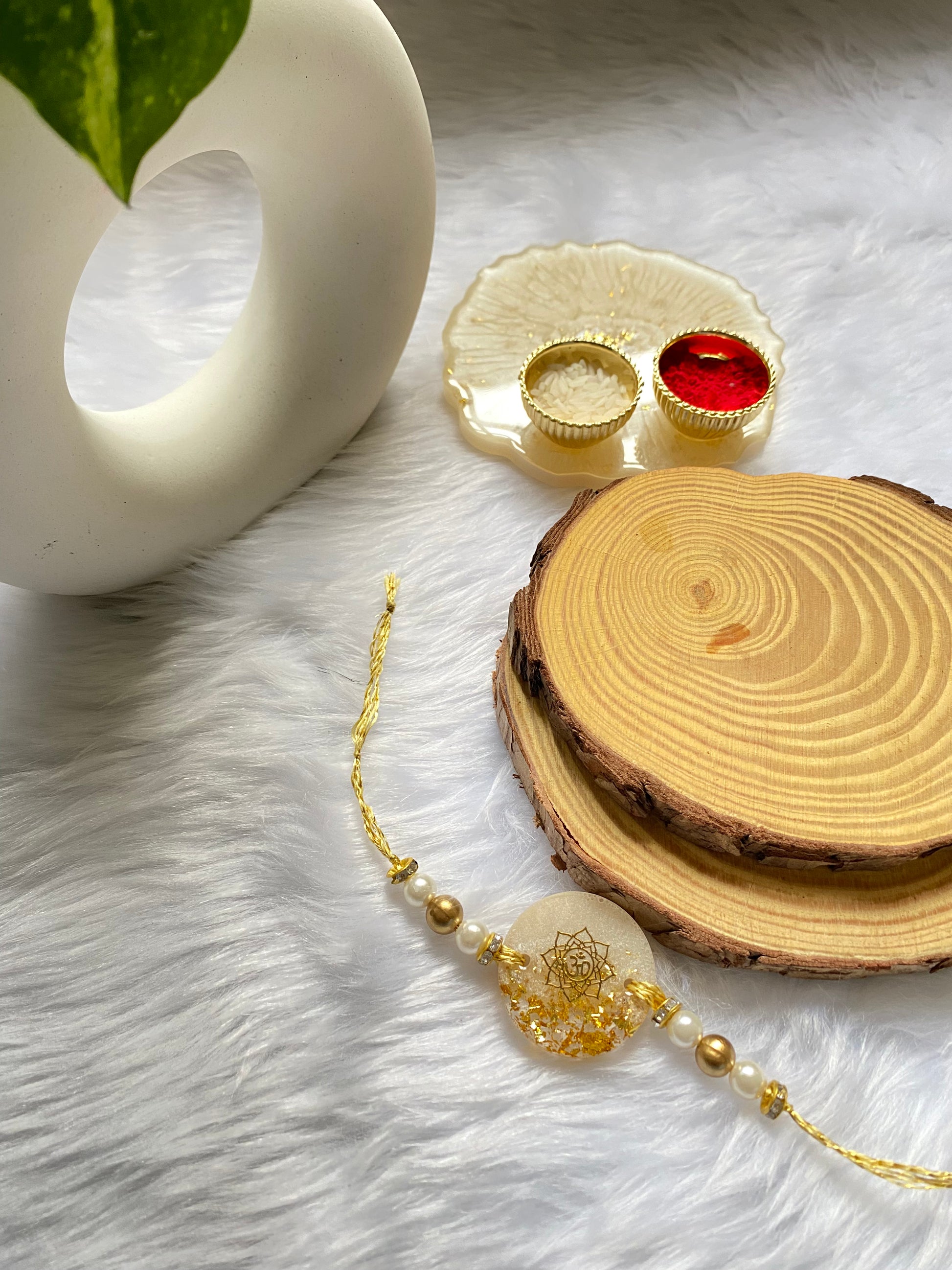 White and Golden Unique Resin Rakhi